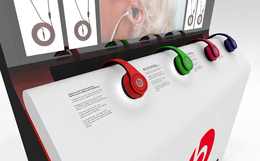 Beats by Dr. Dre display counter detail with headphones and in-ear screens